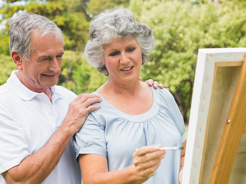 Picture of older couple painting