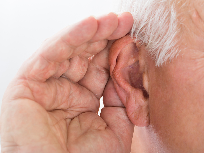 Picture of hand up to an ear