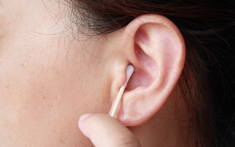 Ear with q-tip in it