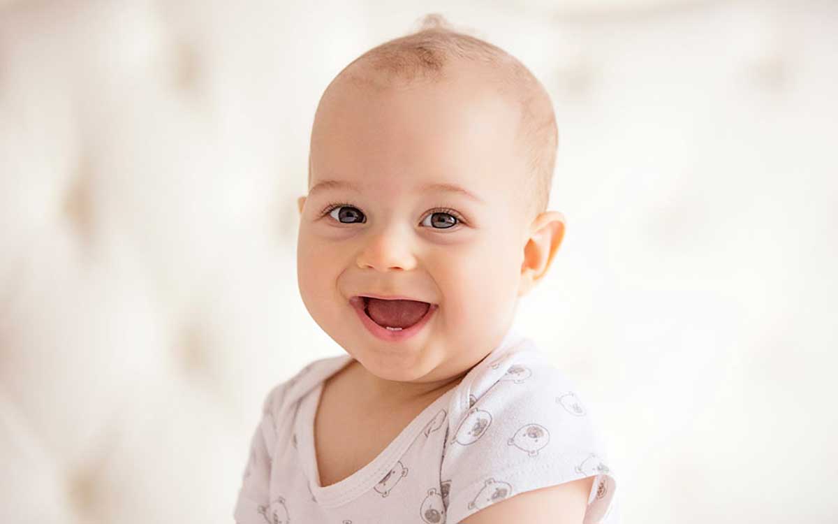 Happy baby. What are you missing by suffering from hearing loss?