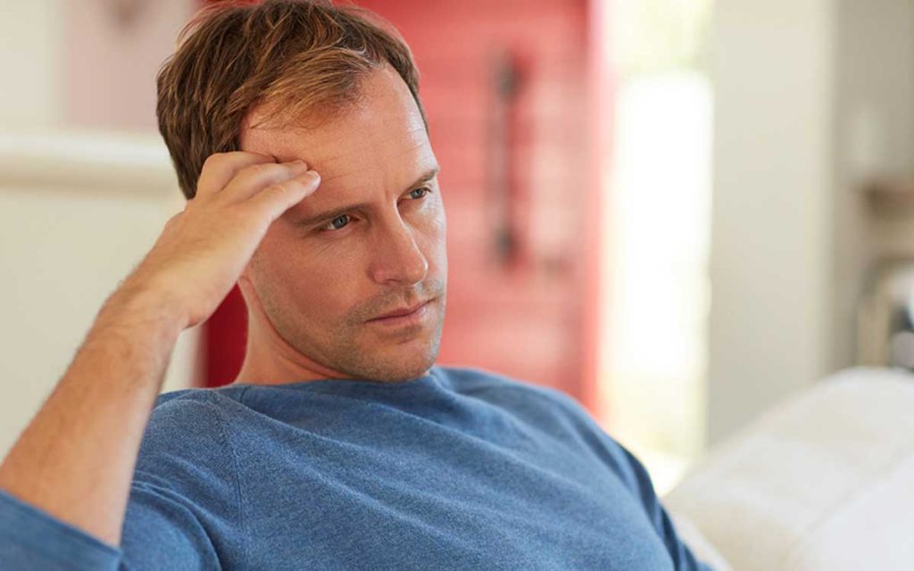 Man concerned about hearing loss.