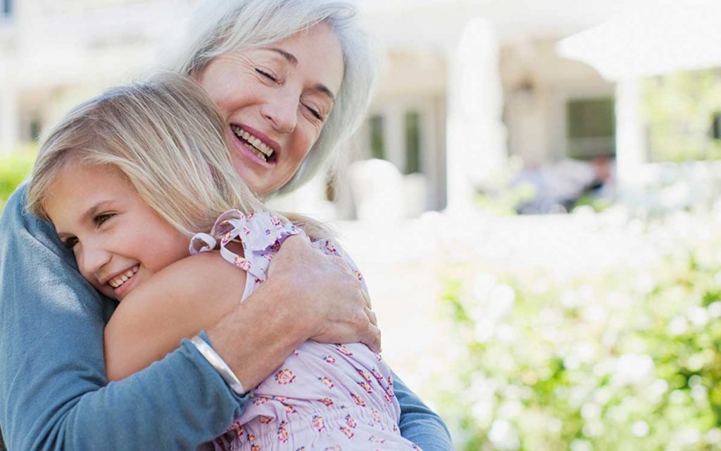 Grandmother and granddaughter. Hearing loss facts for loved ones.