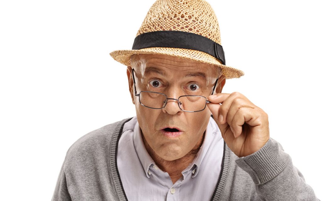 Shocked man because he's learned hearing loss facts.