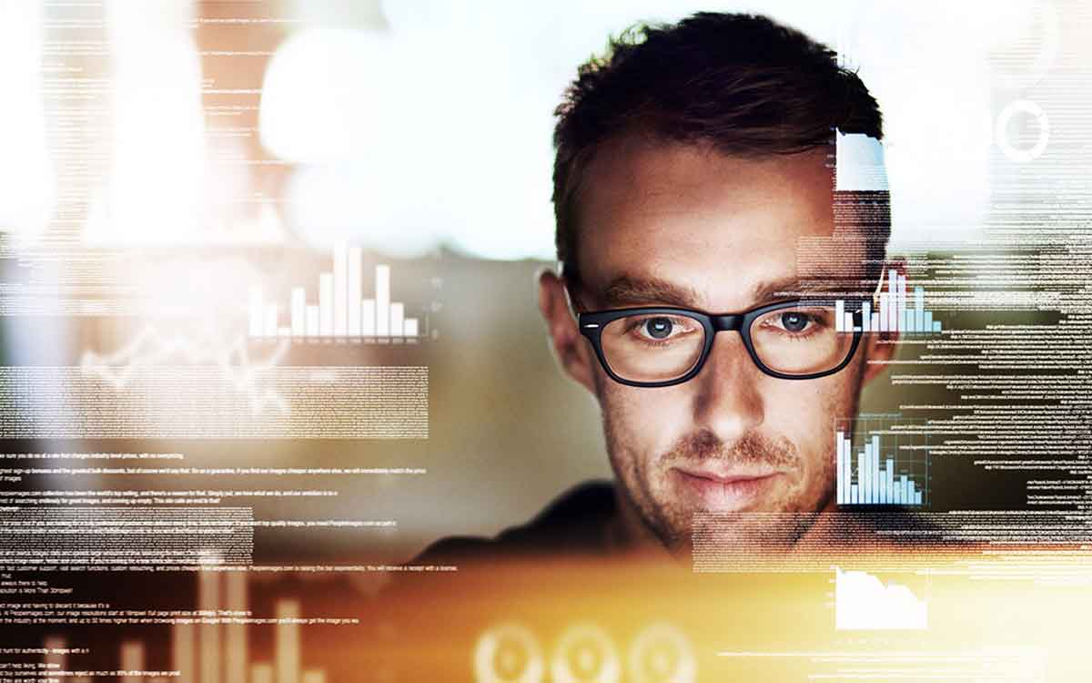 Programmer working on algorithms to improve hearing aids.