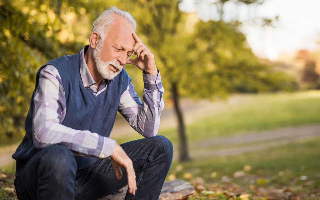 Man very upset becasue of problems with his hearing aids.