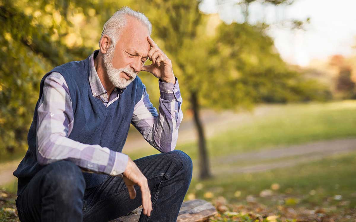 Man very upset becasue of problems with his hearing aids.