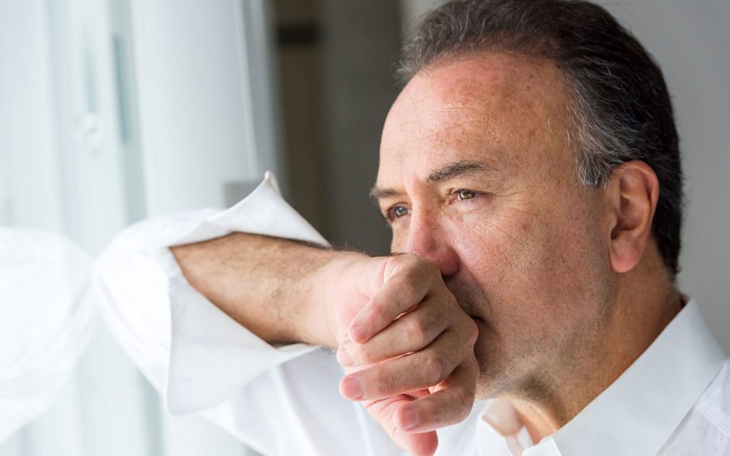 Man suffering from Tinnitus and experiencing depression.