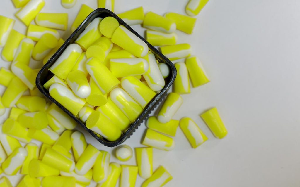 Container full of earplugs for hunters and musicians.