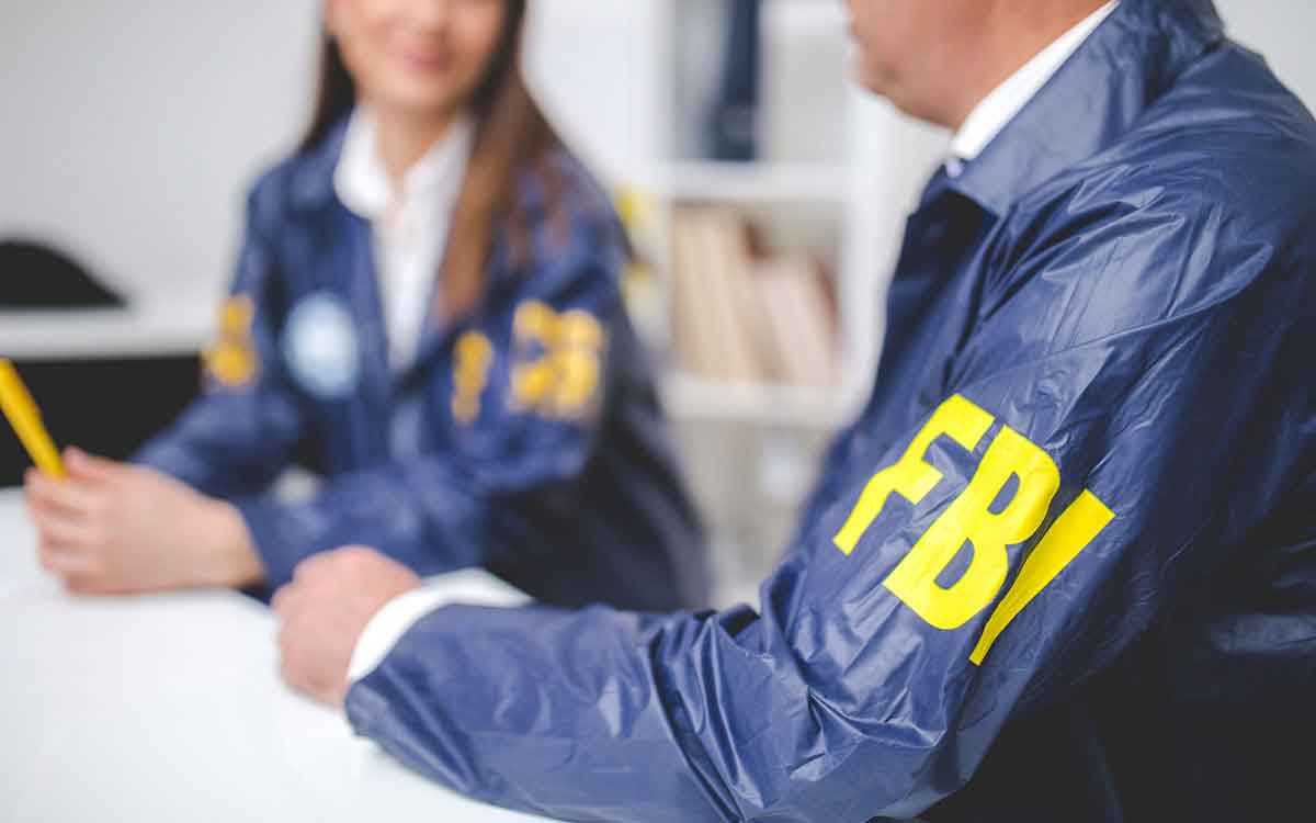 People wearing FBI uniforms hearing loss.