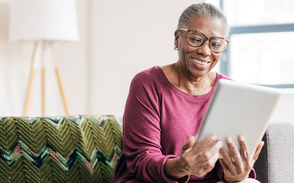 Woman looking at the results of her health monitoring device.