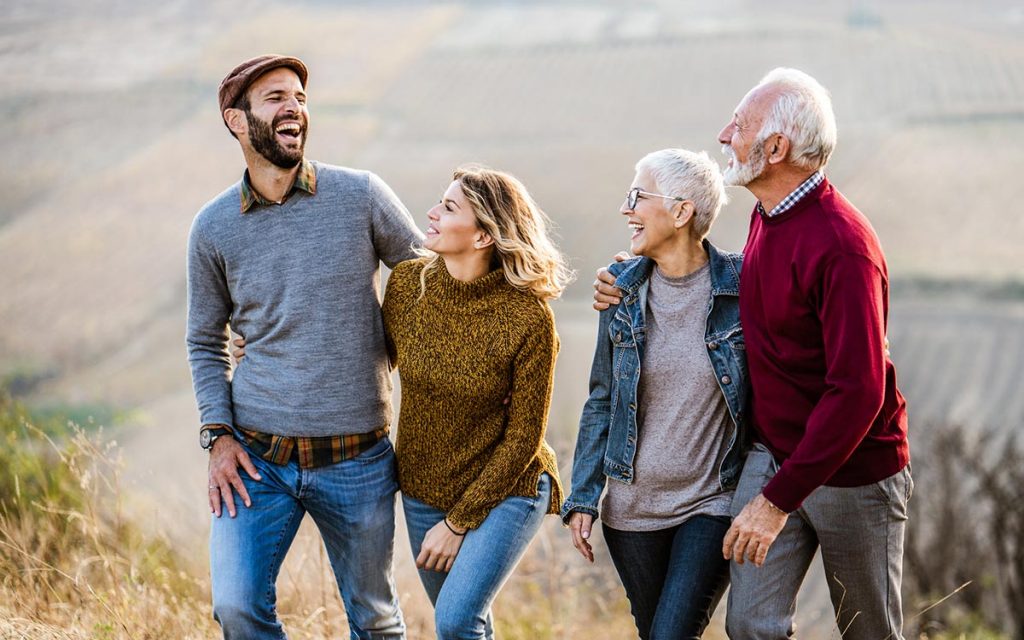 Happy senior benefitting from wearing hearing aids.