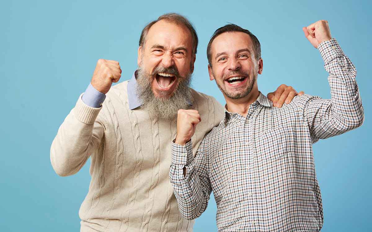 Excited men because hearing aids are the best they've ever been.