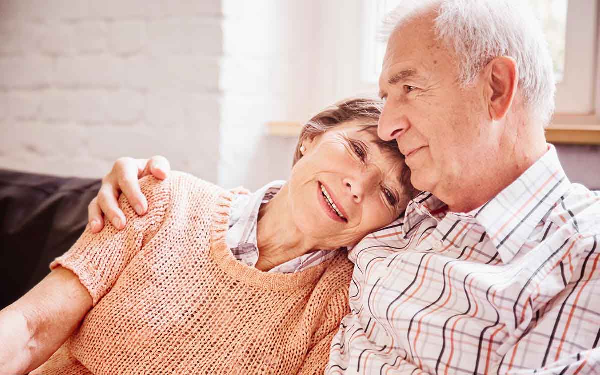 Senior couple able to remember becasue of hearing aids.