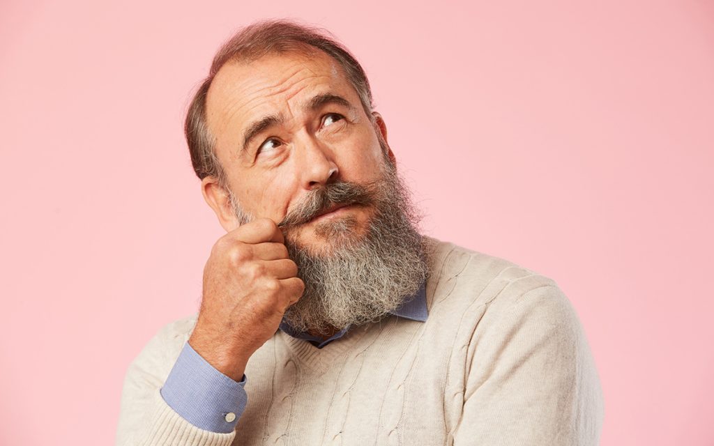 Senior man wondering what's stopping him from getting a hearing aids.