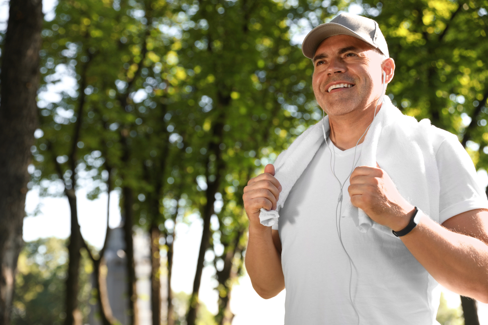 man exercising in park.