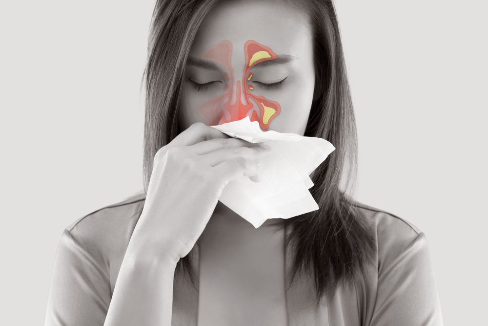 woman with a sinus infection.