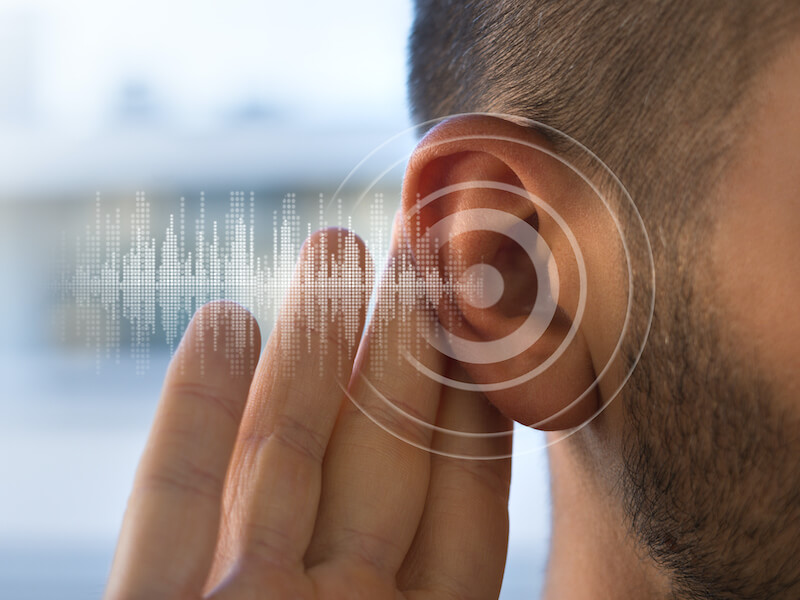 Man with hearing problems or hearing loss. Hearing test concept.