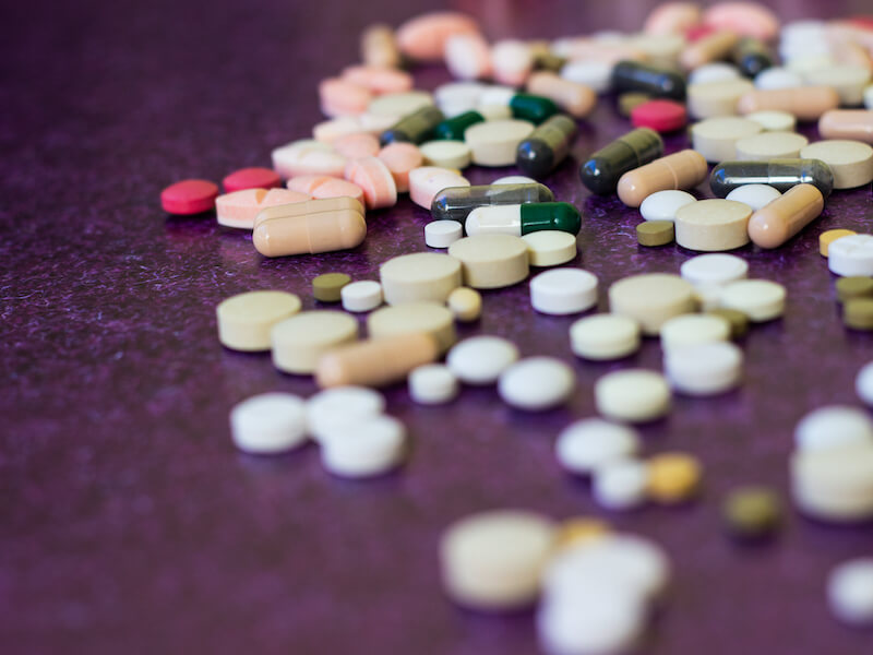 Close up of colorful medications that can cause hearing loss.